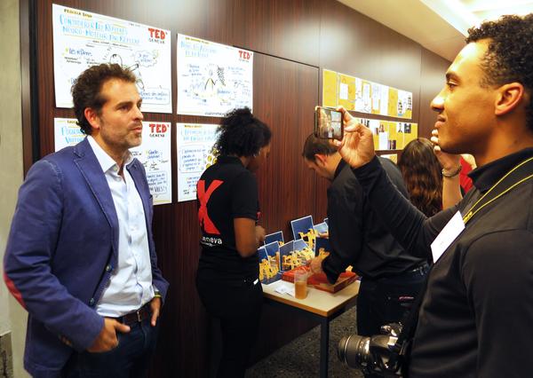 Posters of the first 4 talks displayed during the break